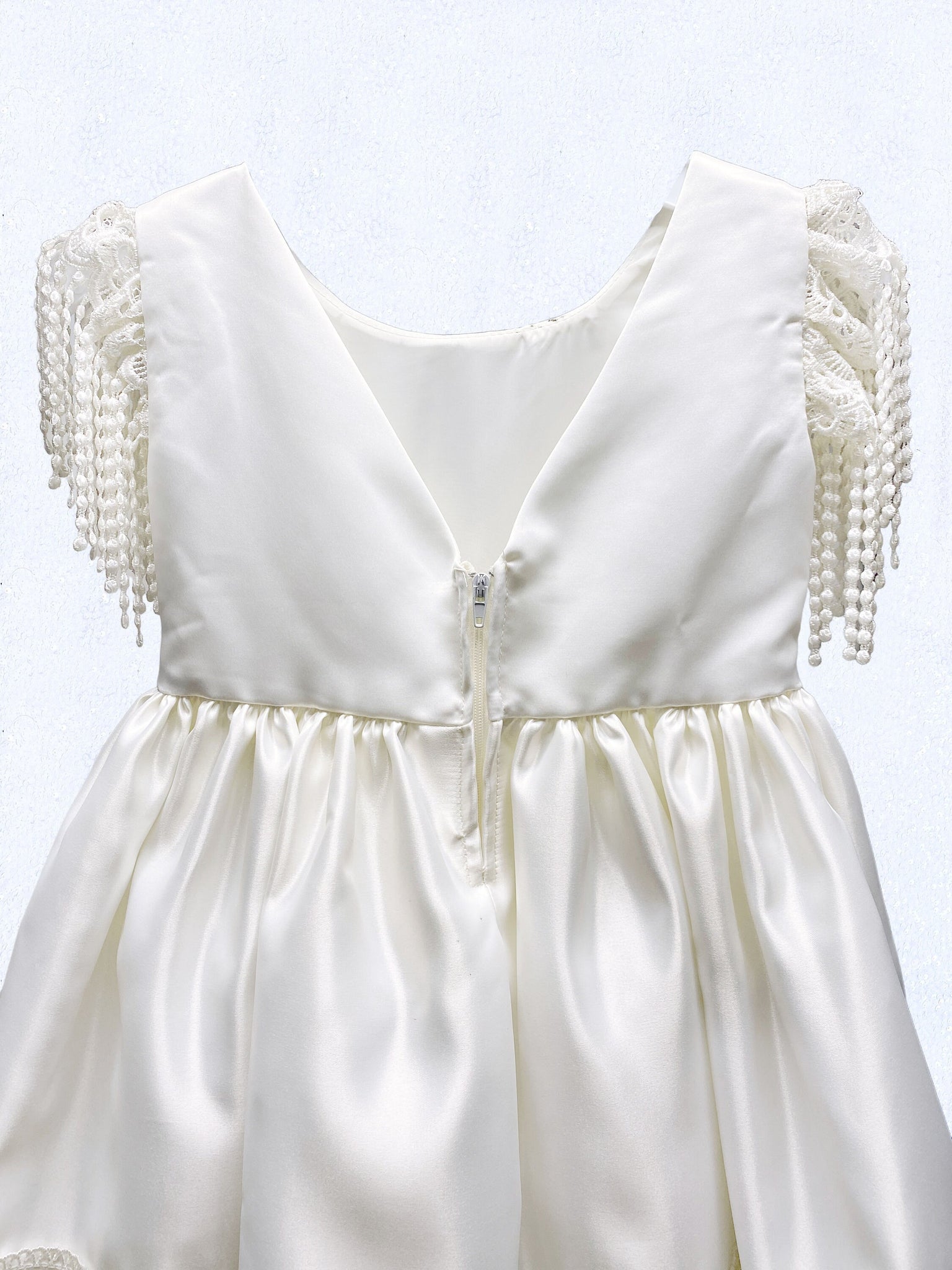 Off White Ivory V-Back Knee Length Tassel Hem Dress